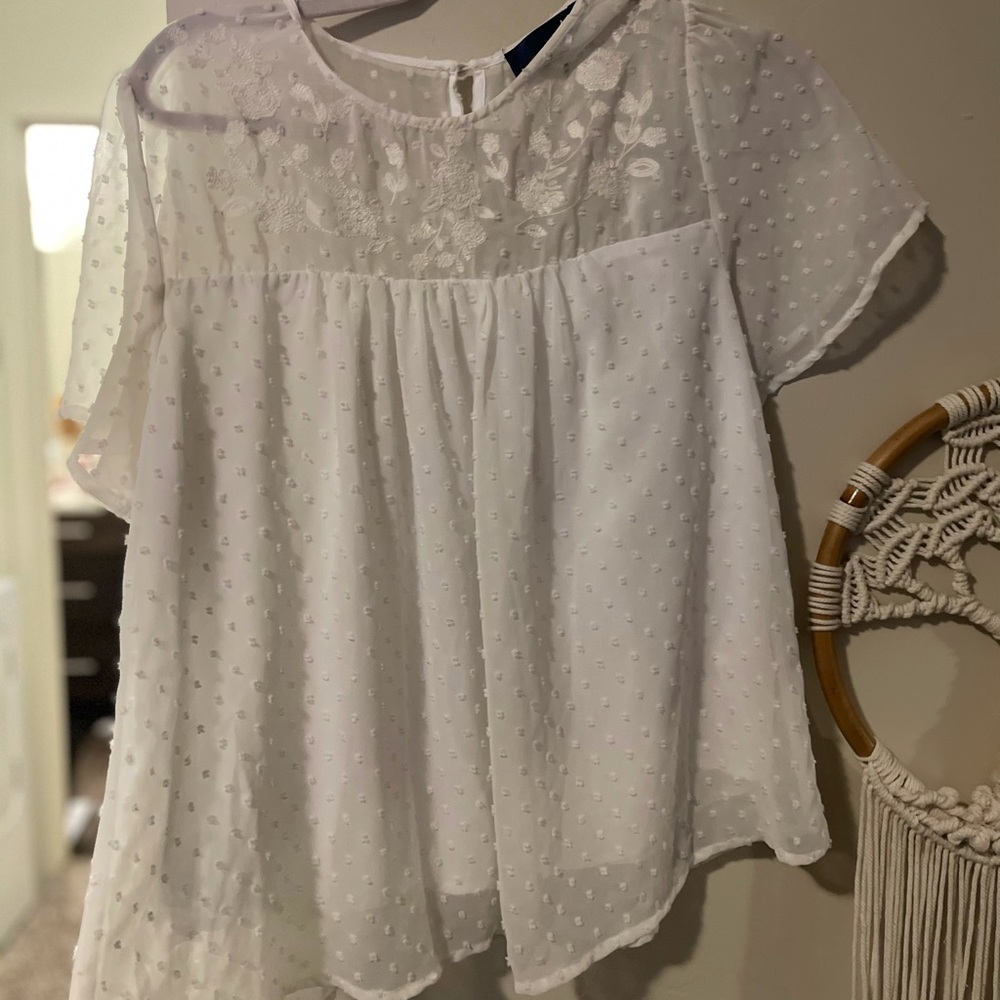 Francescas white blouse